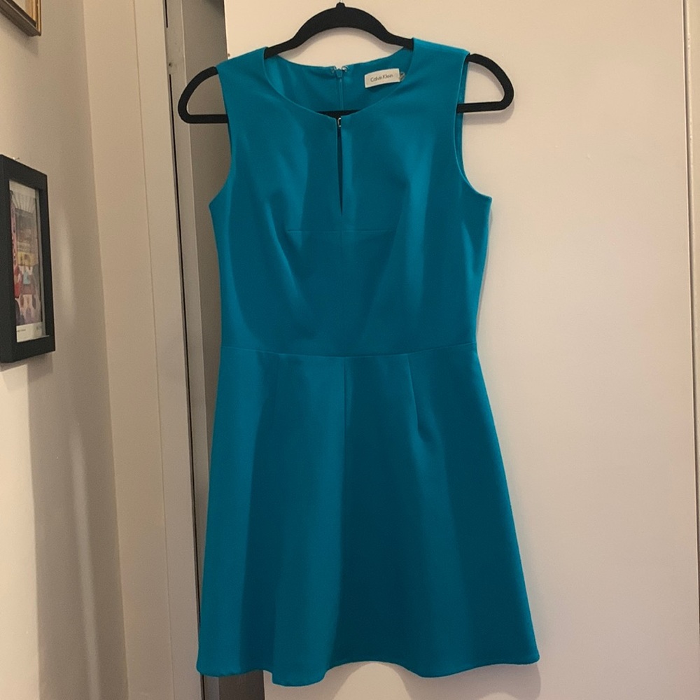 Calvin Klein teal skater dress - perfect for work.  Snap front with a v dip.